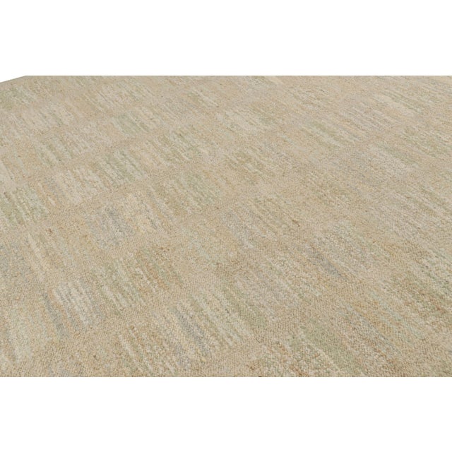 This 10x14 rug, handwoven in a wool flatweave, is from the inventive “Nu” texture in Rug & Kilim’s award-winning...