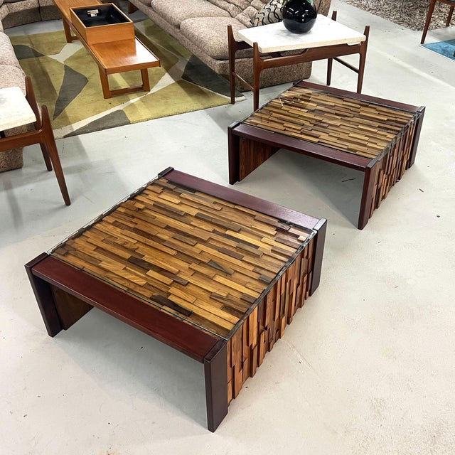 Pair of exceptional Brazilian-Modern tropical hardwood side tables by Percival Lafer. The premium tropical hardwoods are...