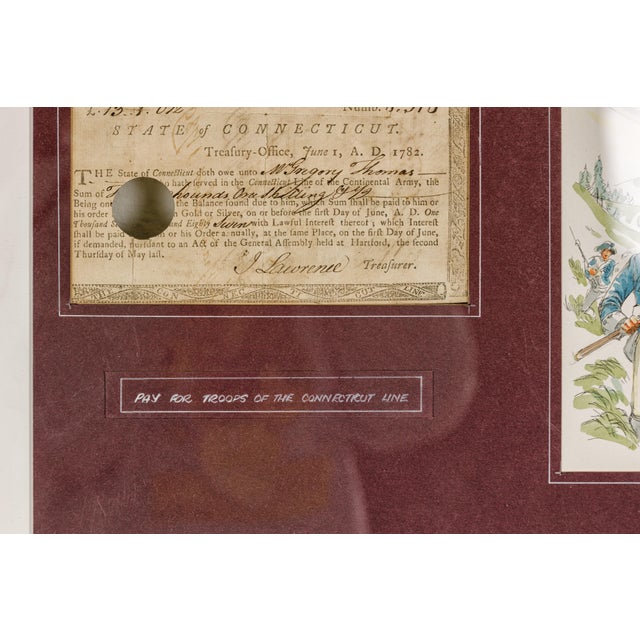 An American Revolutionary war bond from the State of Connecticut from circa 1782 in custom black frame under glass. Step...