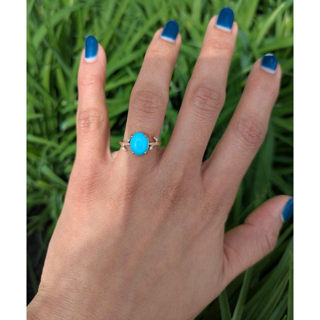 2.1 ct Sonoran Turquoise ring featuring a vibrant 10×8 mm centerpiece, accented with natural diamonds for a refined...