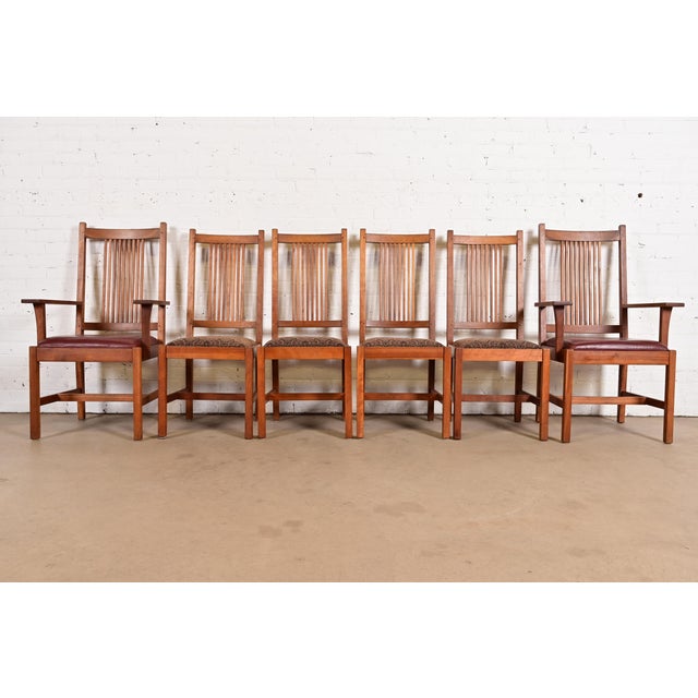 An exceptional set of six Mission or Arts & Crafts style spindle back dining chairs By L. & J.G. Stickley USA, 1994 Solid...