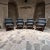 AMBIANIC presents Set of Four Fabulous Modern Armchairs Floating Mahogany Wood Legs IRGSA Mexico City Dark Gray Vinyl...