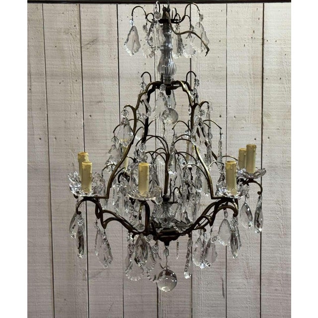 Pair of 8-light bronze chandeliers with Baccarat crystal drops - 1950s work - 4 cups replaced - H=80cm D=50cm. European...
