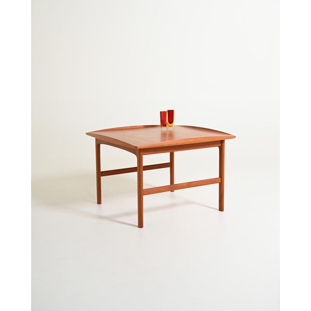 Teak coffee table. "Frisco" model, designed by Folke Ohlsson for Tingströms, Sweden. Original hallmark present. Designed...