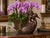 A beautifully sculptural vintage Korean cast metal planter featuring a charming cherub embracing a graceful swan. Finished...