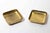 Elegant small rectangular lidded box in polished gold-tone metal, featuring softly rounded corners and a minimalist...