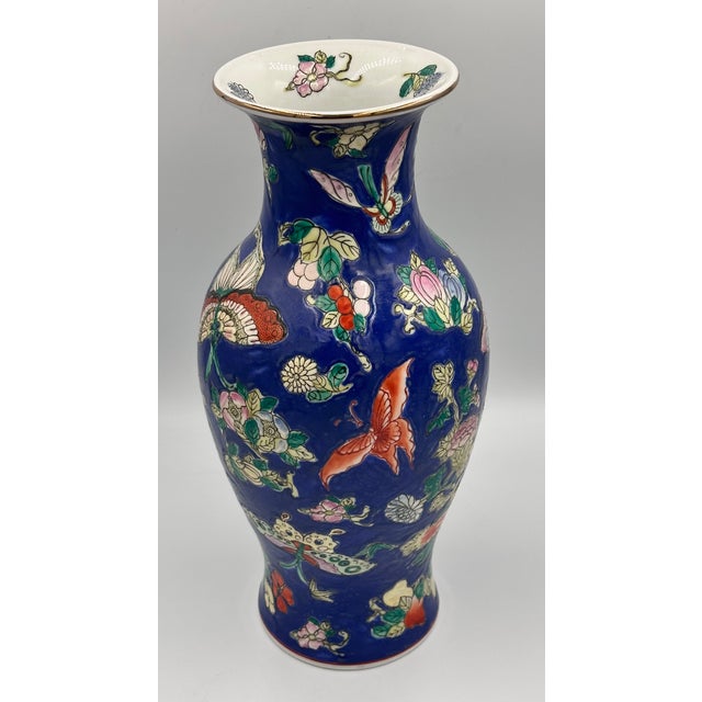 Prepare to be captivated by this exquisite Chinese Blue Ceramic Vase, a true treasure waiting to adorn your home. This...