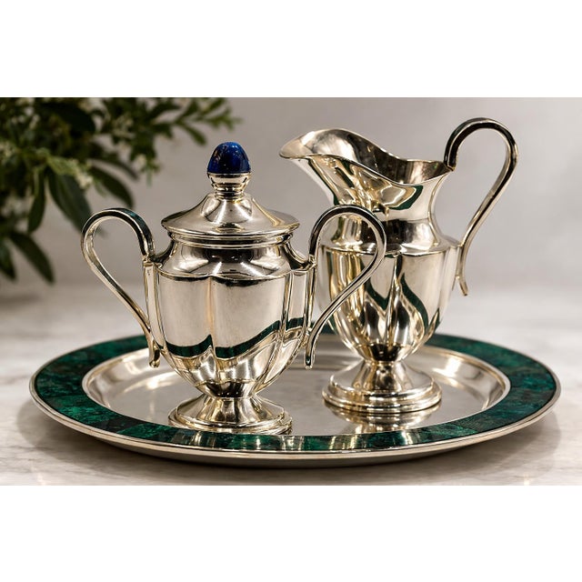 A refined vintage silver-plated coffee or tea service designed and produced by the celebrated Los Castillo silversmith...
