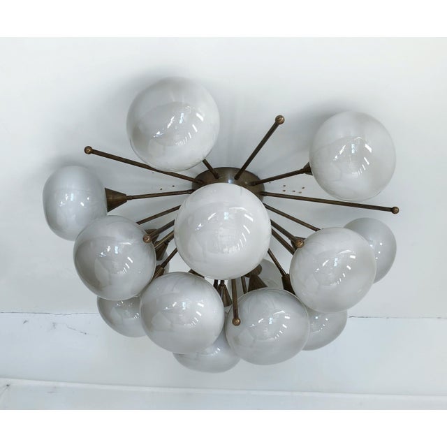 Italian sputnik flush mount with glossy gray pebble shaped Murano glass shades mounted on solid brass frame in bronze...