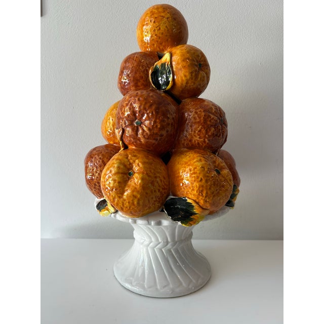 Vintage Italian Majolica topiary. Hand-made in Italy. Tromp l'oeil pyramid of ripened oranges complete with realistic...