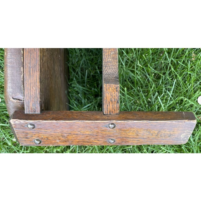 This antique Arts and Crafts style footstool is a unique, handmade piece signed by craftsman Jacob Kessler. Featuring a...