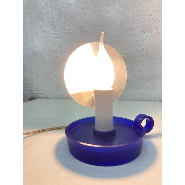 One table lamp from the 2000s, model B.L.O., designed by Marcewl Wanders for Flos, single-bulb, E14 socket, with a flame-...
