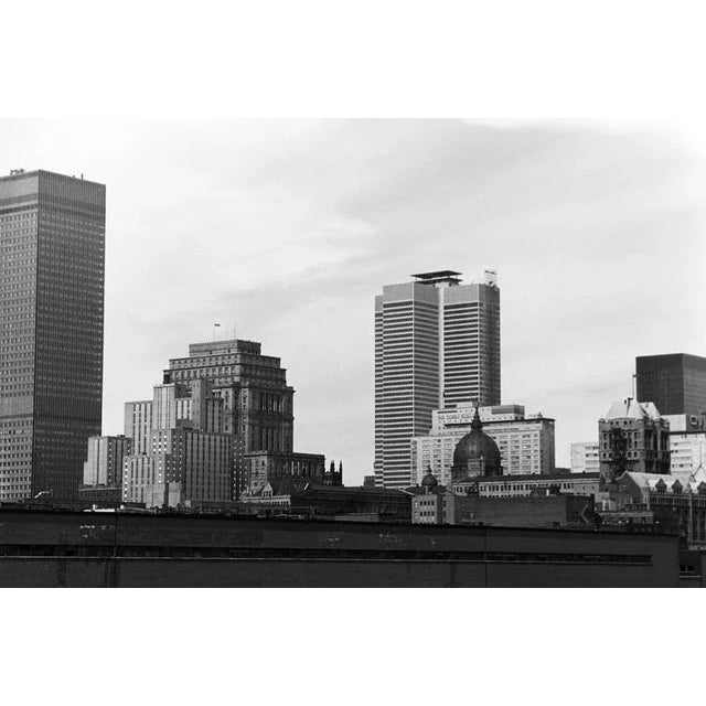 Montreal, Quebec, Canada, 1960s, black and white view of the city's skyline featuring a mix of historic and modern...