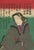 Original Japanese ukiyo-e color woodblock actor portrait (yakusha-e), showing a kabuki performer against a striking red...