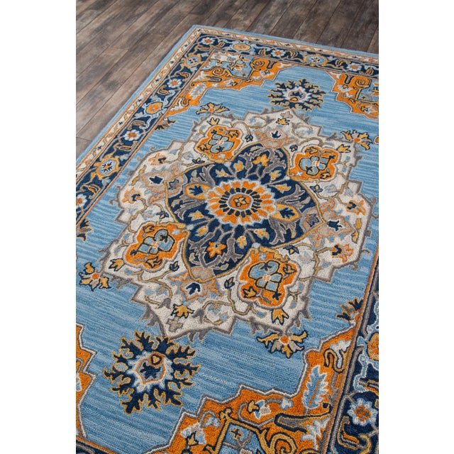 The saturated shades of this decorative area rug reinvent the classic Persian carpet in a vivid color palette. The...