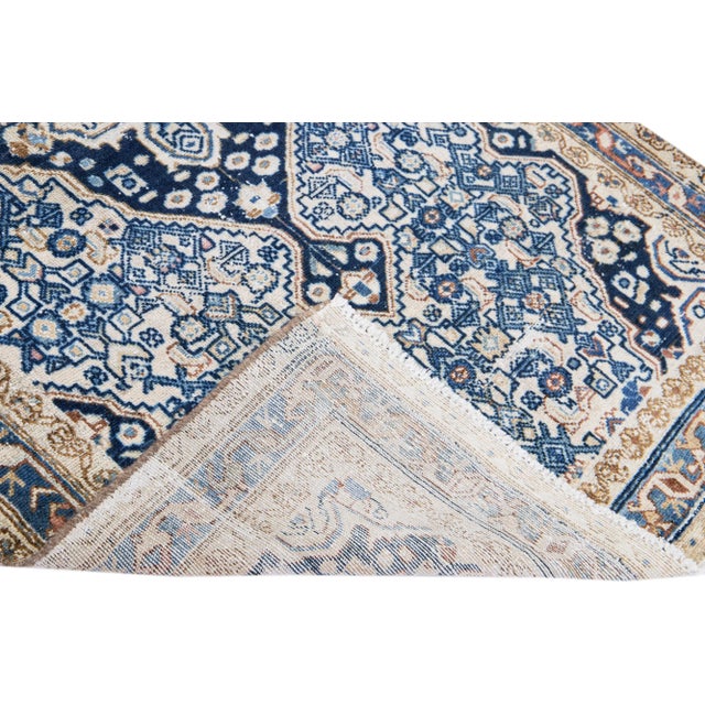 Beautiful vintage Persian Hamadan hand-knotted shabby chic wool rug with a navy blue field. This piece has a navy blue...