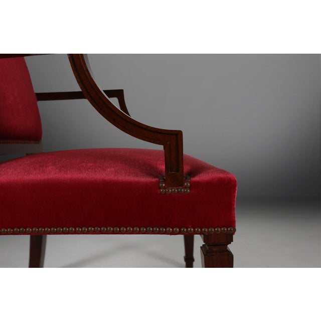 A refined tribute to the grandeur of early 19th‑century French design, this set of three Belgian armchairs. Crafted in the...