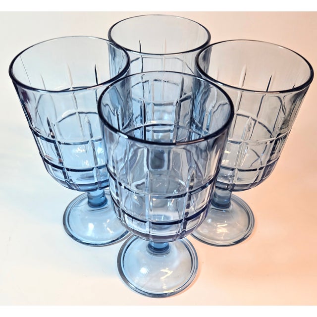 Thick blue goblets with a cut glass look- without the lead or the delicacy of it. The springy periwinkle blue is a fresh...