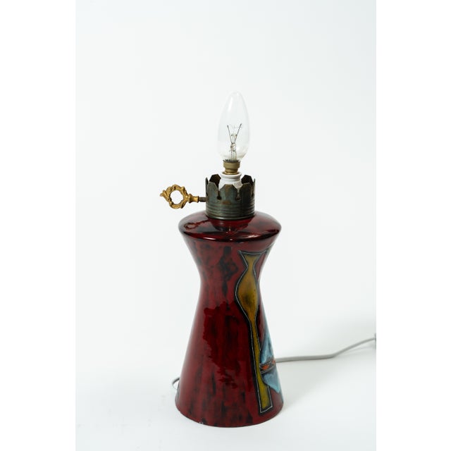 A rare table lamp by Augusto Giulianelli, an outstanding ceramic artist from San Marino, known for his modern art ceramics...