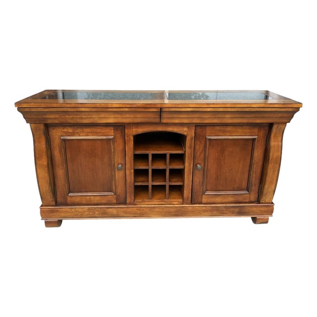 Traditional Wood Buffet With Stone-Inset Top and Wine Storage For Sale