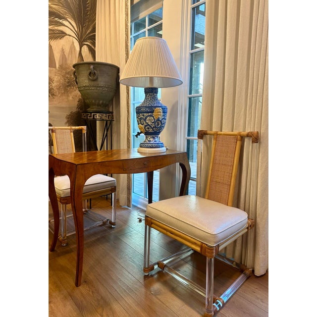 Glamorous set of (3) Mid-Century modern dining chairs, a rare and unusual combination - clear Lucite, bamboo and woven...
