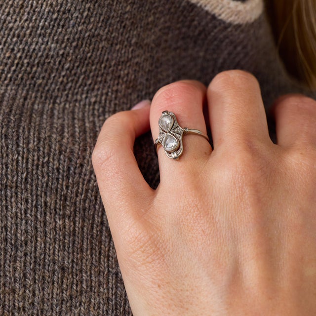 This elegant Edwardian diamond ring is a beautifully refined jewel from the 1910’s, featuring 2 principal rose cut...