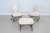 Very rare set of three pieces composed of two low slipper chairs and one ottoman or footstool. Designed by Renzo Zavanella...