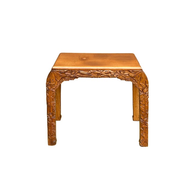 The Vintage Oriental Floral Relief Carving Light Brown U Shape Stool Side Table is a captivating piece that seamlessly...