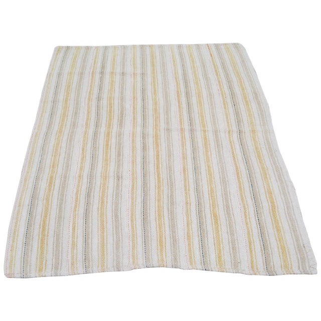 Flatweaved with care using traditional rug-making techniques, this wool rug blends timeless craftsmanship with a modern...