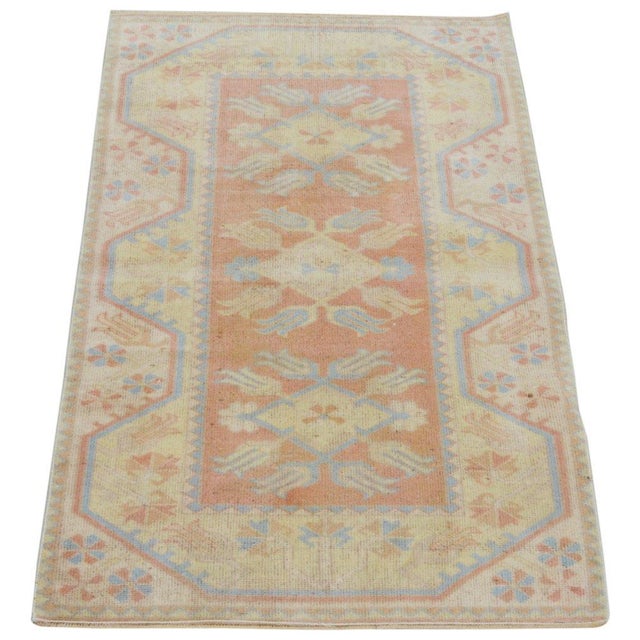 Hand-knotted with care using traditional rug-making techniques, this wool rug blends timeless craftsmanship with a modern...