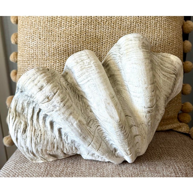 This large vintage ceramic clam shell bowl features a beautifully sculpted natural shell form with dramatic ridges and a...