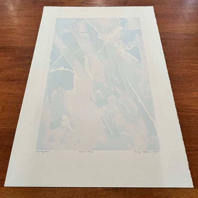 This is an original artists proof titled “Ice Crystals” by Carol Morgan. It features a sharp looking, colorful, abstract...