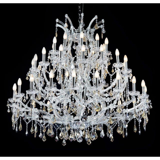 Maria theresa 45 lights gold and silver chandelier by aggiolight. Dimensions: d 135 x h 120 cm. Materials: polished...