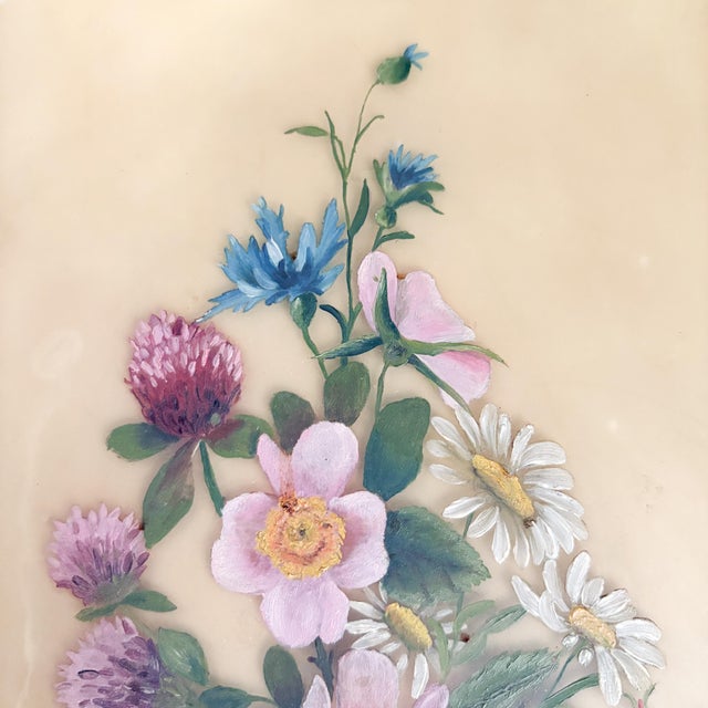 This is a beautifully rendered floral painting on a matte custard colored piece of glass. Most paintings of this era and...