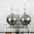 Pair of spherical mercury glass table lamps with blue tint.