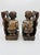 An exceptional and highly detailed pair of mid-century hand-carved ethnographic bookends depicting indigenous musicians...