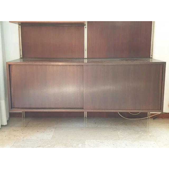 Italian Wall Shelf by O. Borsani for Tecno, 1960s, in Very Good conditions. Designed 1960 to 1969 This piece has an...