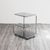 Elegant food cart from the 1970s, made of chrome-plated steel with three smoked glass shelves. The sinuous, minimalist...