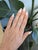 A continuous line of natural diamonds brings quiet brilliance to this slender band, hand-set in solid 14K white gold....