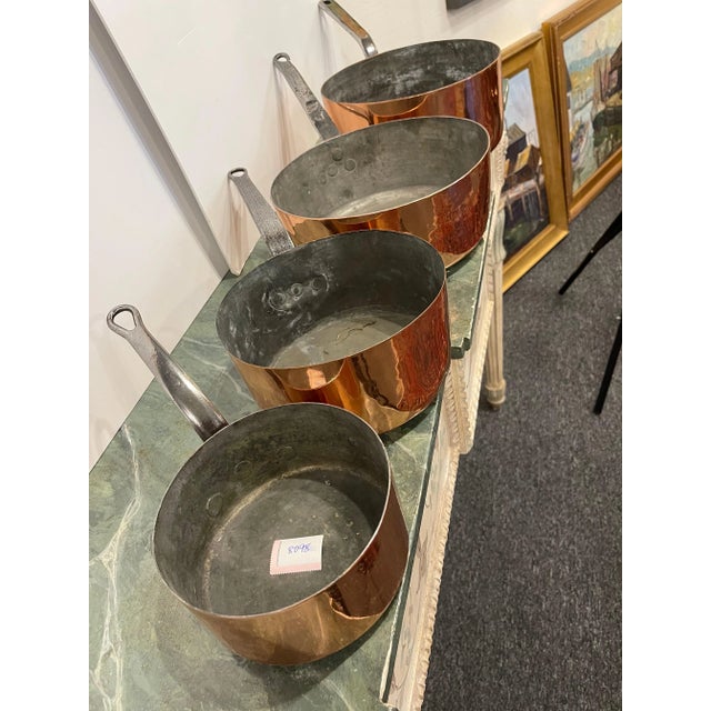 Set of French Four Copper Pots in Different Sizes, 19th Century. Professionally cleaned and polished in France. A light...