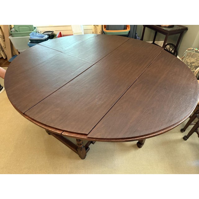 Wood 19th Century Oversized Oval Gate-Leg Drop Leaf Oak Dining Table For Sale - Image 7 of 16