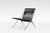 PK25 lounge chair designed by Poul Kjærholm and manufactured by Fritz Hansen. Featuring a black flagline seat and a...