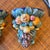 Fabulous vintage set of ceramic wall brackets. Very colorful and beautifully made. Adorned with grapes and fruits, these...