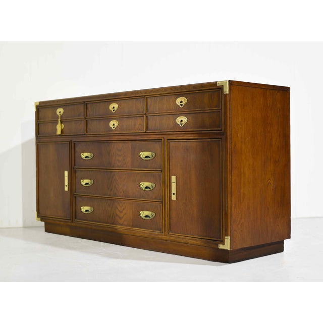 This 1970s Campaign Style Sideboard by Lexington Furniture is an amazing addition to your decor. The buffet is built to...