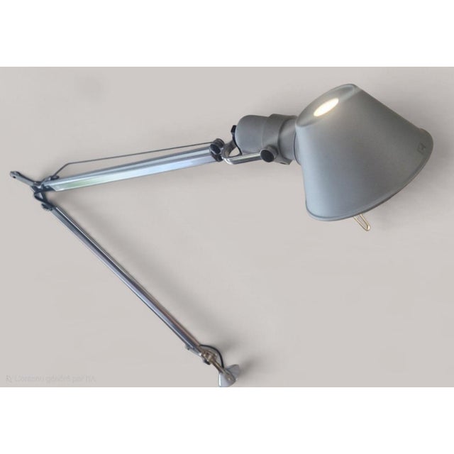 Articulated architect's lamp by the italian brand artemide, tolomeo tavolo model, designed by michele de lucchi and...