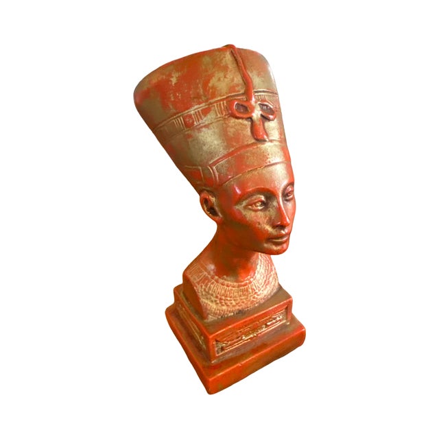 A striking vintage bust of Queen Nefertiti, one of the most recognizable and admired figures of ancient Egypt. Beautifully...