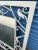 White Metal Mirror by Ballard Designs . Birds Adorn around the Metal Frame .