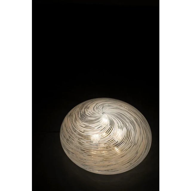 Nice brass ceiling lamp. This ceiling lamp has white/clear crank glass. This lamp is in good vintage condition....