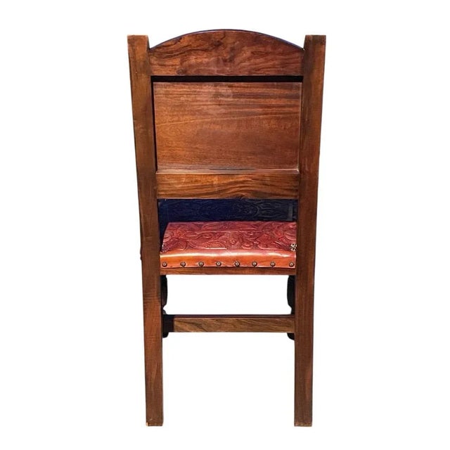 Absolutely stunning! Extremely well built, hand carved and tooled Spanish accent chair. Deep hand carved walnut and tooled...