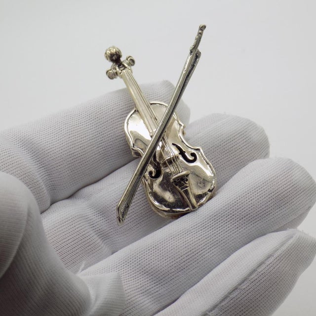 Vintage miniature sculpture depicting a violin with bow, handmade in Italy between the 1980s and 1990s in genuine solid...